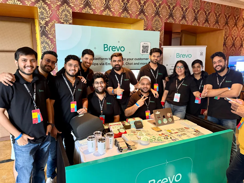 Team Brevo getting clicked at booth